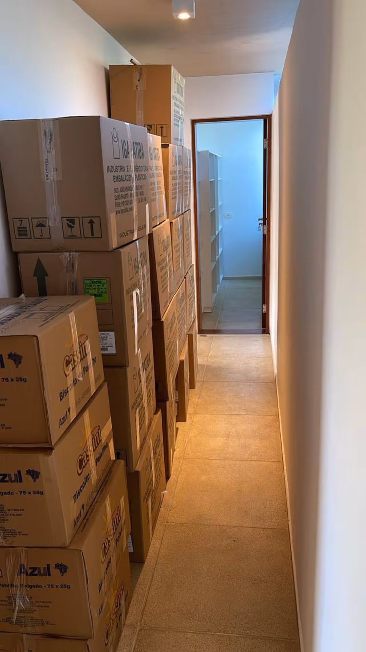 Caixas organizadas durante mudança residencial atendida pela A. Furtuoso